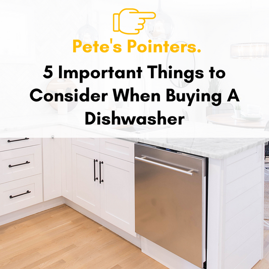 Stainless Steel Dishwasher with White Cabinets and Wood Floor