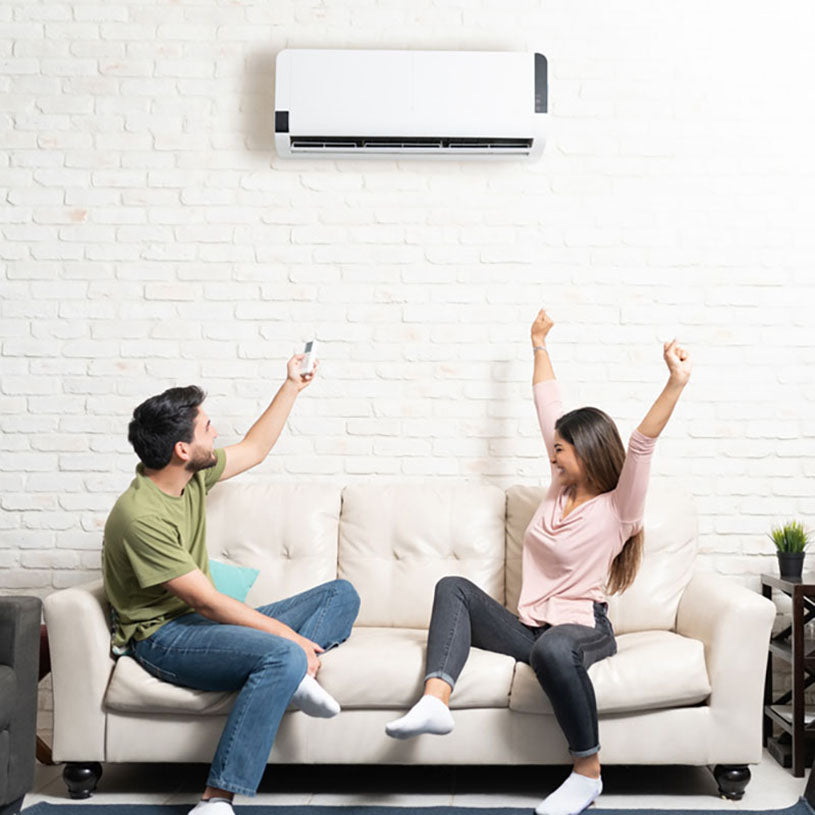 couple using wall mounted mini split