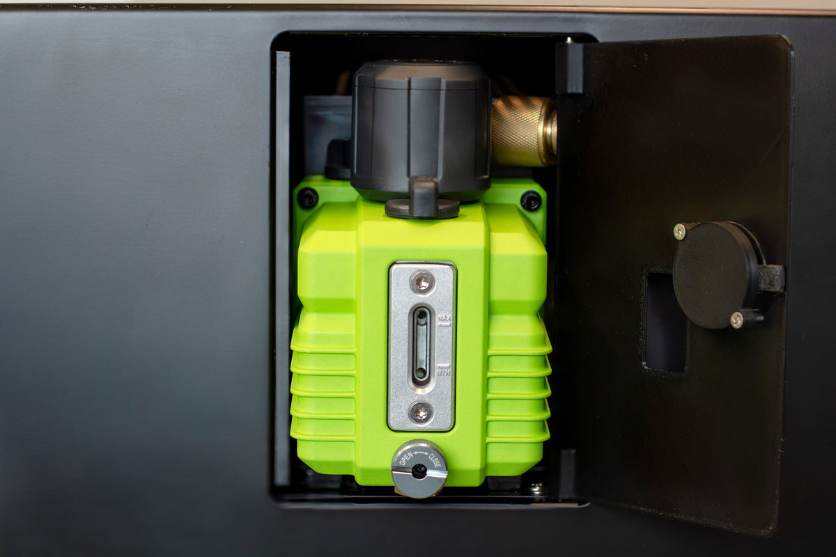 Industrial vacuum pump built into the Harvest Right Countertop 360 freeze dryer