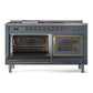 ILVE Nostalgie II 60-Inch Dual Fuel Range with 7 Sealed Burners + Griddle + French Top, 5.8 cu. ft. Oven, Blue Grey with Brass Trim, Liquid Propane, Triple Glass Door, UN60FSNMPBGGLP