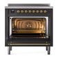 ILVE Nostalgie II 36-Inch Induction Range with 6 Induction Elements, 3.5 cu. ft. Oven, Graphite Matte with Brass Trim, Triple Glass Door, UPI366NMPMGG