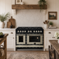 FORNO Ambassador Valente 48" 6.7 cu. ft. Dual Fuel Range, 8 Sealed Burners, Convection Oven in Black with Antique Brass Accents and Copper Rivet Trim, FFSGS6199-48CPBLK