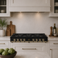 FORNO Ambassador Valente 48" Gas Cooktop, 8 Sealed Burners with 2 Dual Ring Burners, Cast Iron Grates in Black with Antique Brass Accents and Copper Rivet Trim, FCTGS5799-48CPBLK