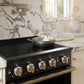 ZLINE Autograph 30 in. 4.2 cu. ft. Marino Induction Range with 4 Element Cooktop and Electric Convection Oven in Black Stainless Steel with Champagne Bronze Accents, MINRBZ-30-CB - Lifestyle Photo 3