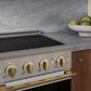ZLINE Autograph 24 in. 3.2 cu. ft. Marino Induction Range with 3 Element Cooktop and Electric Convection Oven in Stainless Steel with White Matte Door and Polished Gold Accents, MINRZ-WM-24-G - Lifestyle Photo 3