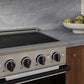 ZLINE Autograph 24 in. 3.2 cu. ft. Marino Induction Range with 3 Element Cooktop and Electric Convection Oven in Stainless Steel with White Matte Door and Matte Black Accents, MINRZ-WM-24-MB - Lifestyle Photo 3