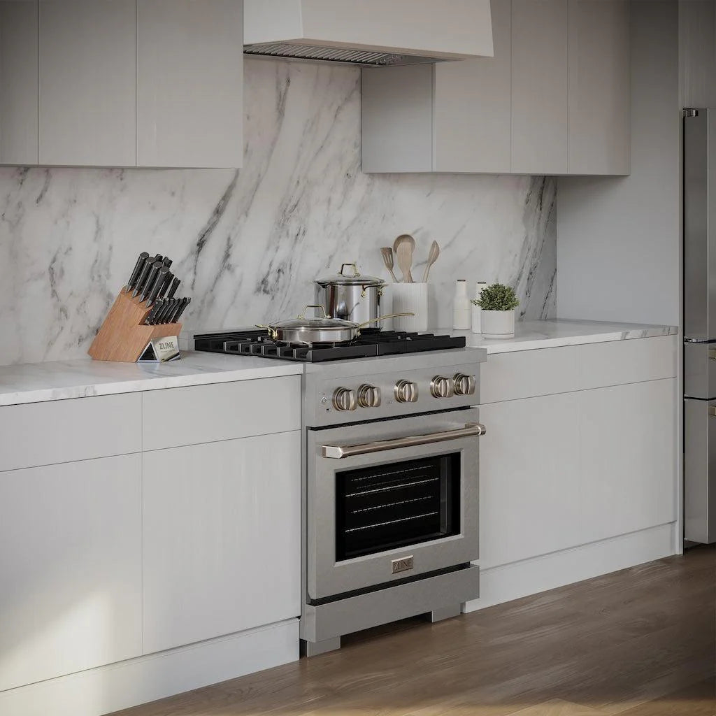 Side angle view of the ZLINE 30-inch 4 Burner Gas Range with Convection Gas Oven in DuraSnow® Stainless Steel, installed in a modern kitchen with marble backsplash and white cabinetry, featuring cookware on the stove and kitchen utensils on the countertop.
