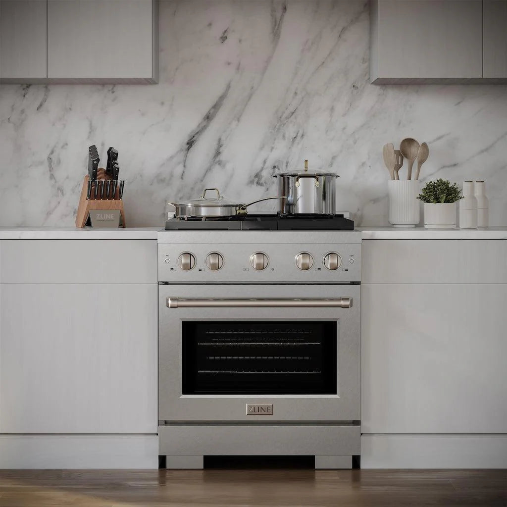 ZLINE 30-inch gas range with four burners and a convection oven, installed in a modern kitchen with white cabinets and marble backsplash.