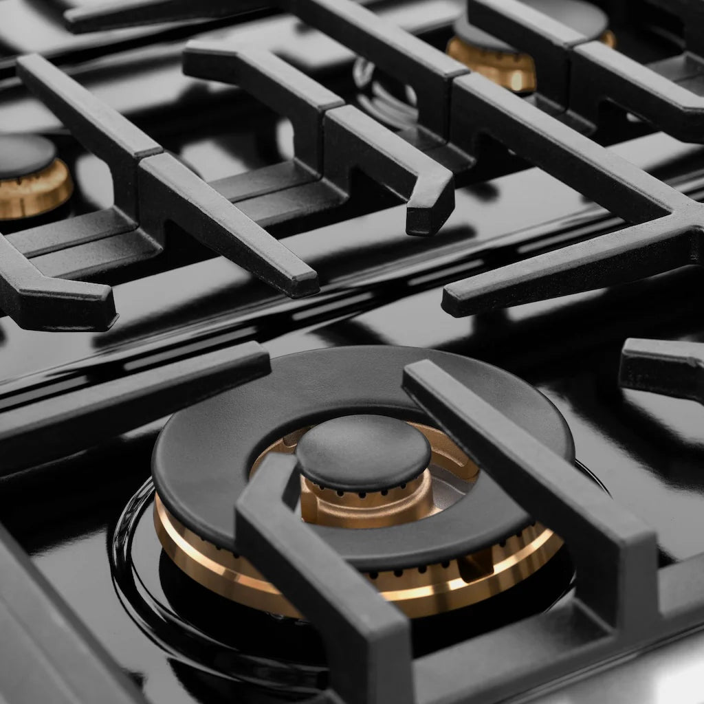 Close-up view of a brass burner on the ZLINE gas range, highlighting the burner grates and brass burner details