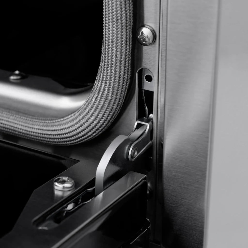 Interior view of the oven showing the fan and light inside the ZLINE 48-inch 6.7 cu. ft. 8 burner double oven gas range in DuraSnow stainless steel and white matte doors