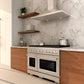 Lifestyle shot featuring ZLINE 48-inch 8-burner double oven gas range in DuraSnow stainless steel finish