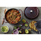 Staub 7 Qt. Cast Iron Round Dutch Oven in Grenadine