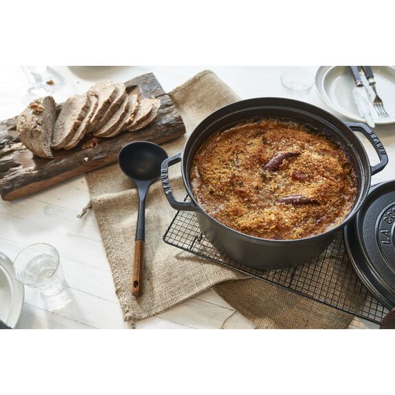 Staub 7 Qt. Cast Iron Round Dutch Oven in Black