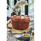 Staub 5.5 Qt. Cast Iron Round Dutch Oven in Burnt Orange