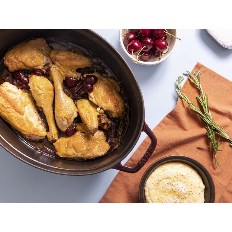Staub 7 Qt. Cast Iron Oval Dutch Oven in Grenadine
