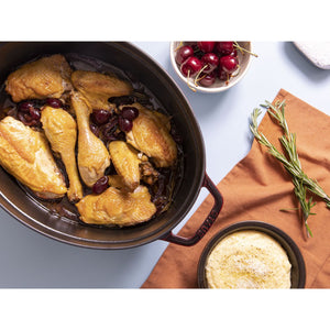 Staub 7 Qt. Cast Iron Oval Dutch Oven in Grenadine