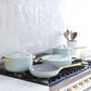Caraway Non-Toxic and Non-Stick Cookware Set in Silt Green with Gold Handles