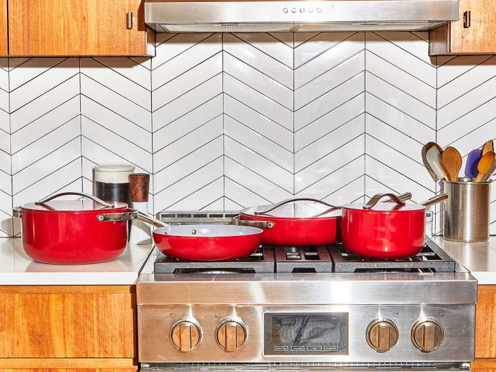 Caraway Red Cookware Set on Kitchen Range