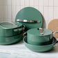 Caraway Cookware Set in Sage on Countertop