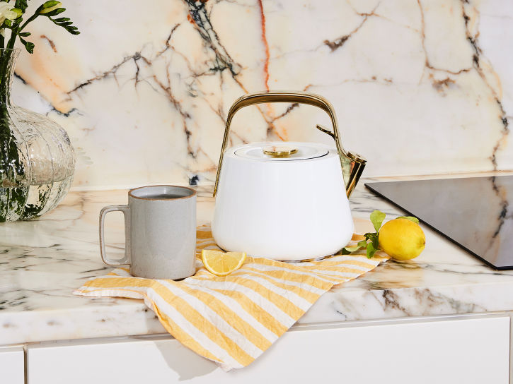 Caraway Whistling Tea Kettle in White with Gold Accents