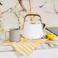 Caraway Whistling Tea Kettle in White with Gold Accents