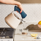 Caraway Whistling Tea Kettle in Cream